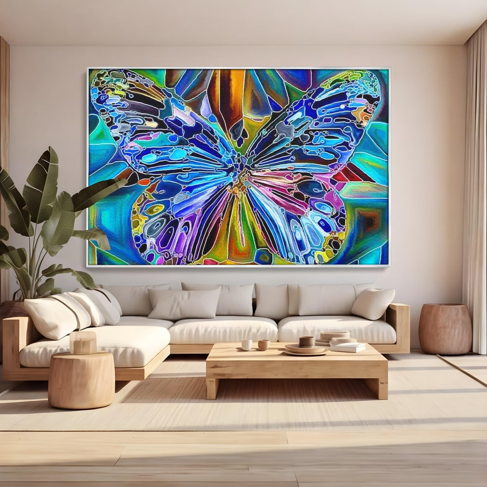 Tablou canvas cu tablou canvas cu fluture mozaic multicolor, in rama de aluminiu argintiu, pe perete intr-un living